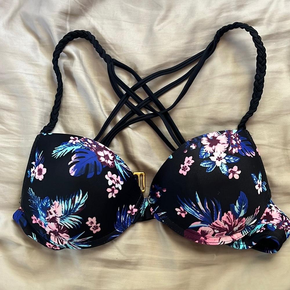 Bathing suit top- black with blue/pink floral design. Size small. 34B would fit